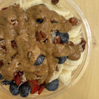 Prana Cafe - Asai bowl with banana, blueberry, strawberry, nuts, coconut and almond butter. - Cafes Near Me - Austin, Texas Prana Cafe - Asai bowl with banana, blueberry, strawberry, nuts, coconut and almond butter. - Cafes Near Me - Austin, Texas