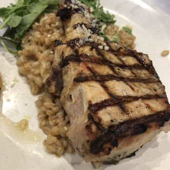 Not Your Average Joe's - Woodbridge - Pork chop w/ risotto & arugula - New American Near Me - Woodbridge, Virginia Not Your Average Joe's - Woodbridge - Pork chop w/ risotto & arugula - New American Near Me - Woodbridge, Virginia