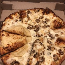 Domino's Pizza - How does pizza make it to the box with dry dough slices & looking like this???
