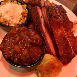 This is the Rib Plate.  Four ribs served with two sides: beans and elotes.