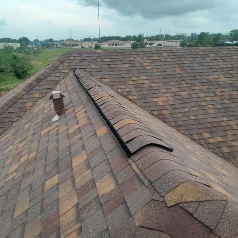 Slide of Urbina Roofing