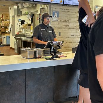 Taco Bell - Cashier taking a white family's order after being turned away and directed to use the kiosk. - Fast Food Near Me - Lebec, California Taco Bell - Cashier taking a white family's order after being turned away and directed to use the kiosk. - Fast Food Near Me - Lebec, California