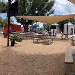 Nice spaced out food truck park. Stage. TV. Music. Bathroom. Kiddie playground