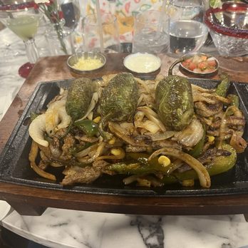 Raices - Chicken fajitas with roasted jalapeños. Authentic Mexican flavors and spices. Delicious - Mexican Near Me - Manchester, New Hampshire Raices - Chicken fajitas with roasted jalapeños. Authentic Mexican flavors and spices. Delicious - Mexican Near Me - Manchester, New Hampshire