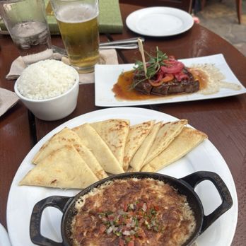 The Olelo Room - PUA'A KĀLUA GRATIN, Steak Bites and Rice - Hawaiian Near Me - Kapolei, Hawaii The Olelo Room - PUA'A KĀLUA GRATIN, Steak Bites and Rice - Hawaiian Near Me - Kapolei, Hawaii