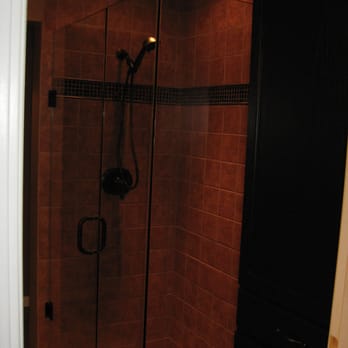 MAD Renovations - a walk in shower in a bathroom - General Contractors Near Me - Cincinatti, Ohio MAD Renovations - a walk in shower in a bathroom - General Contractors Near Me - Cincinatti, Ohio