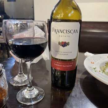 Italian Cravings - a glass of wine and a plate of food - Italian Near Me - San Clemente, California Italian Cravings - a glass of wine and a plate of food - Italian Near Me - San Clemente, California
