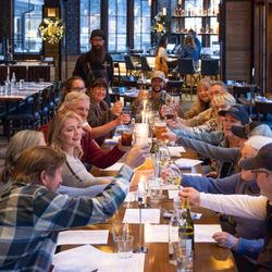 The Reserve - A group of people eat at The Reserve at Tamarack Resort