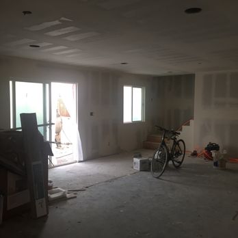Aligned Construction Company - Floor outline in the ground shows were the new concrete started for the addition on the first floor. - General Contractors Near Me - La Crescenta, California