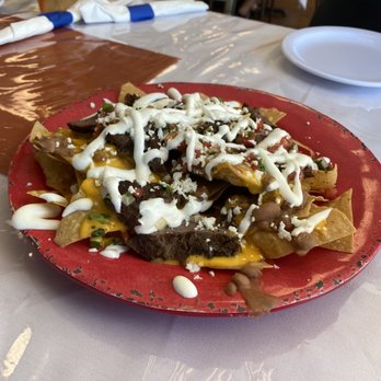 Raizes Mexican Kitchen - Fajita nachos - Mexican Near Me - Stafford, Texas Raizes Mexican Kitchen - Fajita nachos - Mexican Near Me - Stafford, Texas