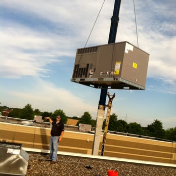 Peak Heating and Cooling Inc - Setting a Roof Top Unit - Heating & Air Conditioning/HVAC Near Me - Chanhassen, Minnesota Peak Heating and Cooling Inc - Setting a Roof Top Unit - Heating & Air Conditioning/HVAC Near Me - Chanhassen, Minnesota