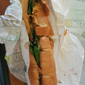 Subway - a sub sandwich on a wrapper - Sandwiches Near Me - Streamwood, Illinois Subway - a sub sandwich on a wrapper - Sandwiches Near Me - Streamwood, Illinois