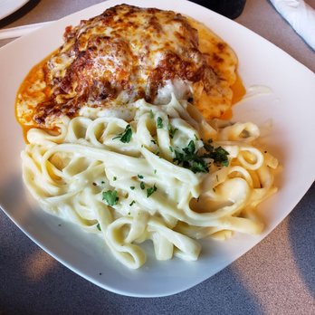 Strings Italian Cafe - Lasagna with a side of pasta - Italian Near Me - Visalia, California Strings Italian Cafe - Lasagna with a side of pasta - Italian Near Me - Visalia, California