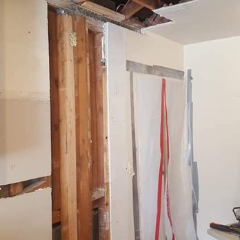 BASSO Engineering - New beam to bear the load of joists connected with hangers and posts to transfer load to existing walls and foundation walls below subfloor - Structural Engineers Near Me - Pasadena, California