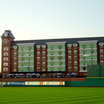 The Patio - a large brick building with a clock tower - Bars Near Me - Manchester, New Hampshire The Patio - a large brick building with a clock tower - Bars Near Me - Manchester, New Hampshire
