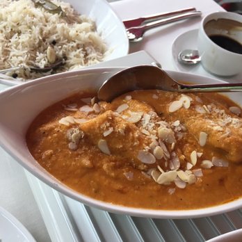 Ekam - Machi Badam Pasanda.  Generous chunks of Zander fish in coconut curry sauce topped with almond slices. - Indian Near Me - Munich, BY