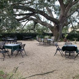 tables and chairs under shade trees tables and chairs under shade trees
