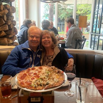 Eno’s Pizza Tavern - Us with pizza! - Pizza Near Me - Dallas, Texas Eno’s Pizza Tavern - Us with pizza! - Pizza Near Me - Dallas, Texas