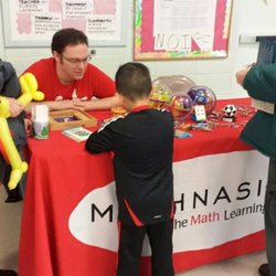 Mathnasium - Our games table at one of the local school fairs!  We also host FREE math nights for schools.