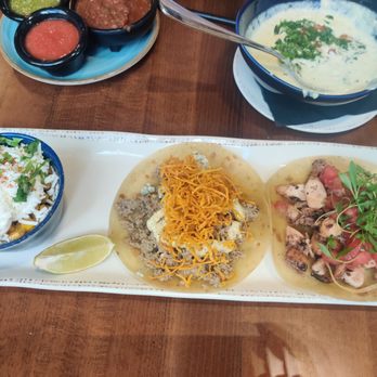 Taco Guild - Right to left: charred octopus taco, molida lamb taco with a side of street corn - Bars Near Me - Phoenix, Arizona