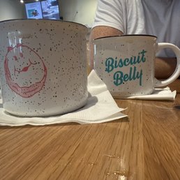 The mugs are empty. But their coffee drinks are tasty even for this not a coffee drinker.