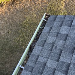 I&O Services - Clogged down spout we cleaned for a customer!