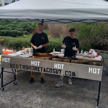 South Shore Taco Guy - two people standing under a tent - Mexican Near Me - Hull, Massachusetts South Shore Taco Guy - two people standing under a tent - Mexican Near Me - Hull, Massachusetts