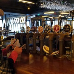 Ruin Bar - The Mrs trying to decide from the plethora of taps.