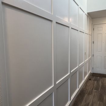 High End Home Remodel - a hallway with white paneled walls - General Contractors Near Me - Conifer, Colorado
