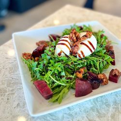House special salad - has beets, burrata, arugula, roasted walnuts, balsamic vinaigrette, & olive oil