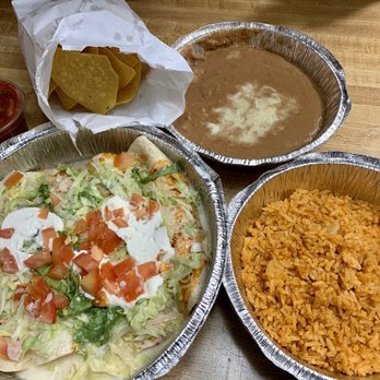Casa Guerrero - House Special "Enchiladas De La Casa" made with flour tortillas instead of corn tortillas. I also purchased sides of Rice and Refried beans. - Mexican Near Me - Greeneville, Tennessee