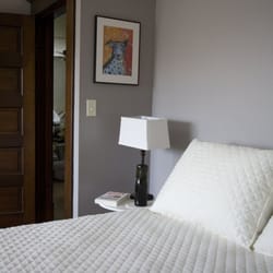 Milkweed Mercantile Llc - The Rachel Carson "Sense of Wonder" Family room features a queen and three twin beds.