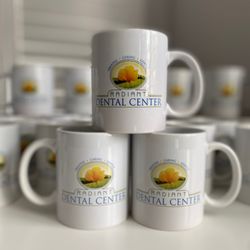 Close up and personal photo of the fine details in the print of the logo. Get your custom mugs made with SUY Prints today!