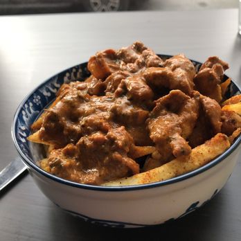 IST Snack Bar - Butter chicken masala and fries - Indian Near Me - Toronto, Ontario