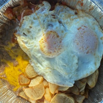 Cafe Leon Mexican Restaurant - Chilaquiles with mild red sauce and eggs over medium - Mexican Near Me - Fresno, California Cafe Leon Mexican Restaurant - Chilaquiles with mild red sauce and eggs over medium - Mexican Near Me - Fresno, California