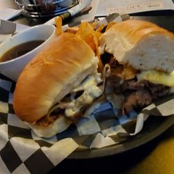 Booyahs Bar and Grill - Prime rib dip, aus just and housemade potato chips $12.50