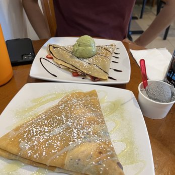 Cafe Hue - Red Redbean and Whipped Cream Crepe in front with black sesame gelato. Nutella Strawberry Banana crepe in the back with matcha gelato. - Creperies Near Me - San Diego, California