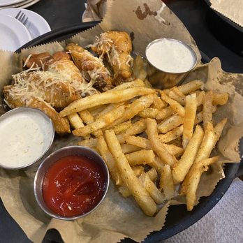 Riverside Johnny’s - garlic parm wings and fries - American Near Me - Daytona Beach, Florida Riverside Johnny’s - garlic parm wings and fries - American Near Me - Daytona Beach, Florida