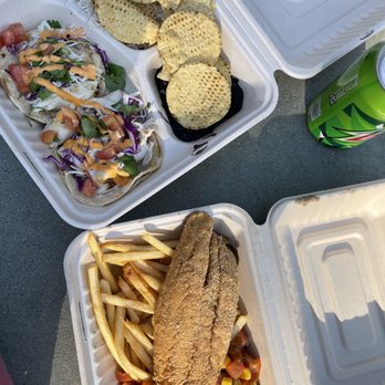 And Fish Company - Mahi Mahi fish tacos and fried sea bass with fries and avocado salsa - Seafood Near Me