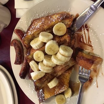 Javier's Café - Apple stuffed French toast with substitute bananas and a side of delicious sausage - Breakfast & Brunch Near Me - Smithtown, New York Javier's Café - Apple stuffed French toast with substitute bananas and a side of delicious sausage - Breakfast & Brunch Near Me - Smithtown, New York