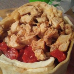 Grilled chicken fresh mooz roasted peppers wrap . Loaded with chicken! Grilled chicken fresh mooz roasted peppers wrap . Loaded with chicken!