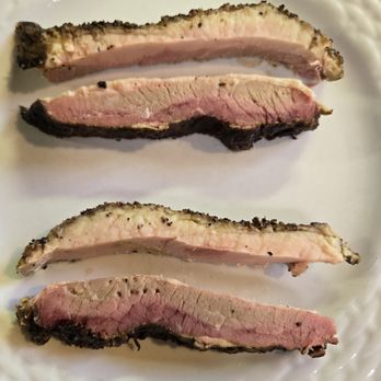 Neighbor Tim's BBQ - two pieces of brisket with the fat cut away - Barbeque Near Me - Boise, Idaho Neighbor Tim's BBQ - two pieces of brisket with the fat cut away - Barbeque Near Me - Boise, Idaho