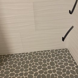 Check marks are discolored tile