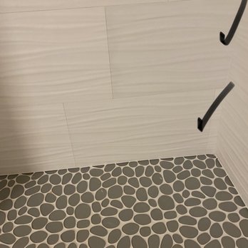 Arizona Tile - Check marks are discolored tile - Flooring Near Me - Austin, Texas