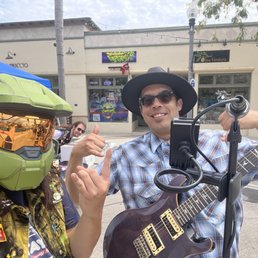 Exterior outside entrance of The Mystery Shop - Rocking out to some love music with Ben Gracie on guitar - Oxnard, California Exterior outside entrance of The Mystery Shop - Rocking out to some love music with Ben Gracie on guitar - Oxnard, California