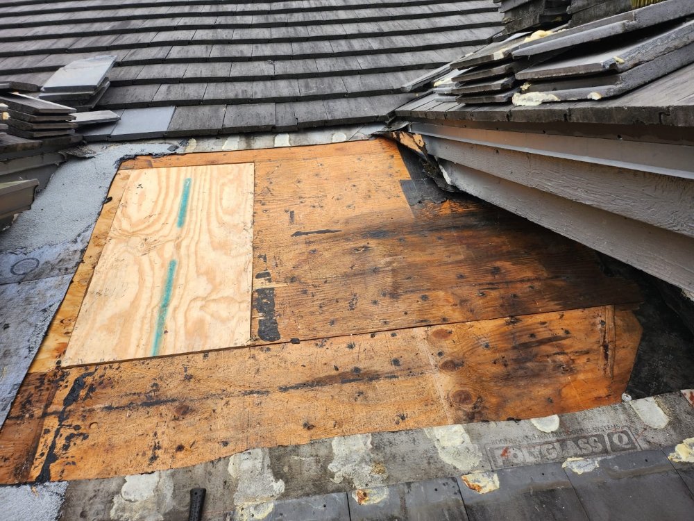 Slide of Extra Myles Roofing