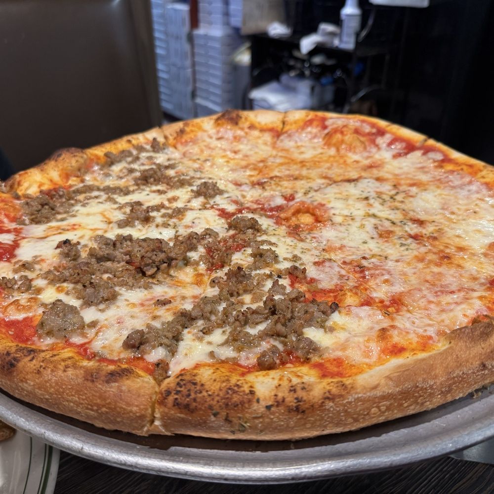 XL Pizza Half cheese, half sausage. XL Pizza Half cheese, half sausage.