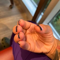 Krystal Nail - The polish doesn't cover and some acrylic is still under my nail.