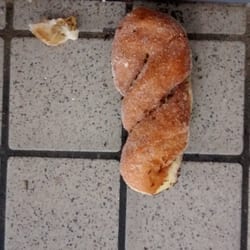 United Dairy Farmers - Busken donut on floor covered with all kinds of ants
