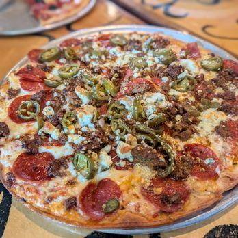 Bazbeaux Pizza - 10" pizza with chorizo, Bleu cheese, jalapeno, and pepperoni - Pizza Near Me - Carmel, Indiana Bazbeaux Pizza - 10" pizza with chorizo, Bleu cheese, jalapeno, and pepperoni - Pizza Near Me - Carmel, Indiana